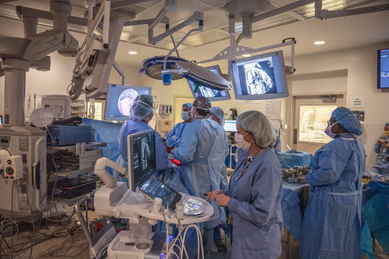 Medical team in scrubs during surgery